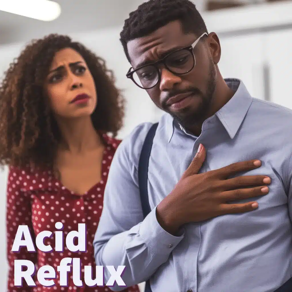 African american male holding his chest because of acid reflux
