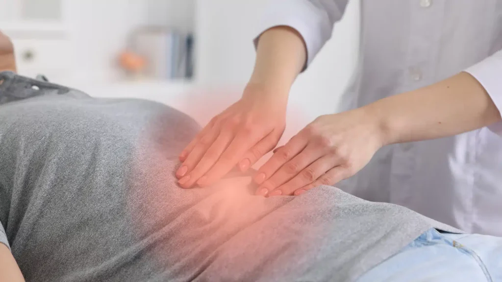 Experienced gastroenterologist at Merus Gastroenterology in Suwanee, GA examining a patient