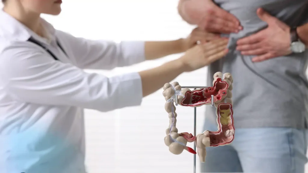 Doctor consulting patient about GERD, IBS, and digestive health issues during medical visit